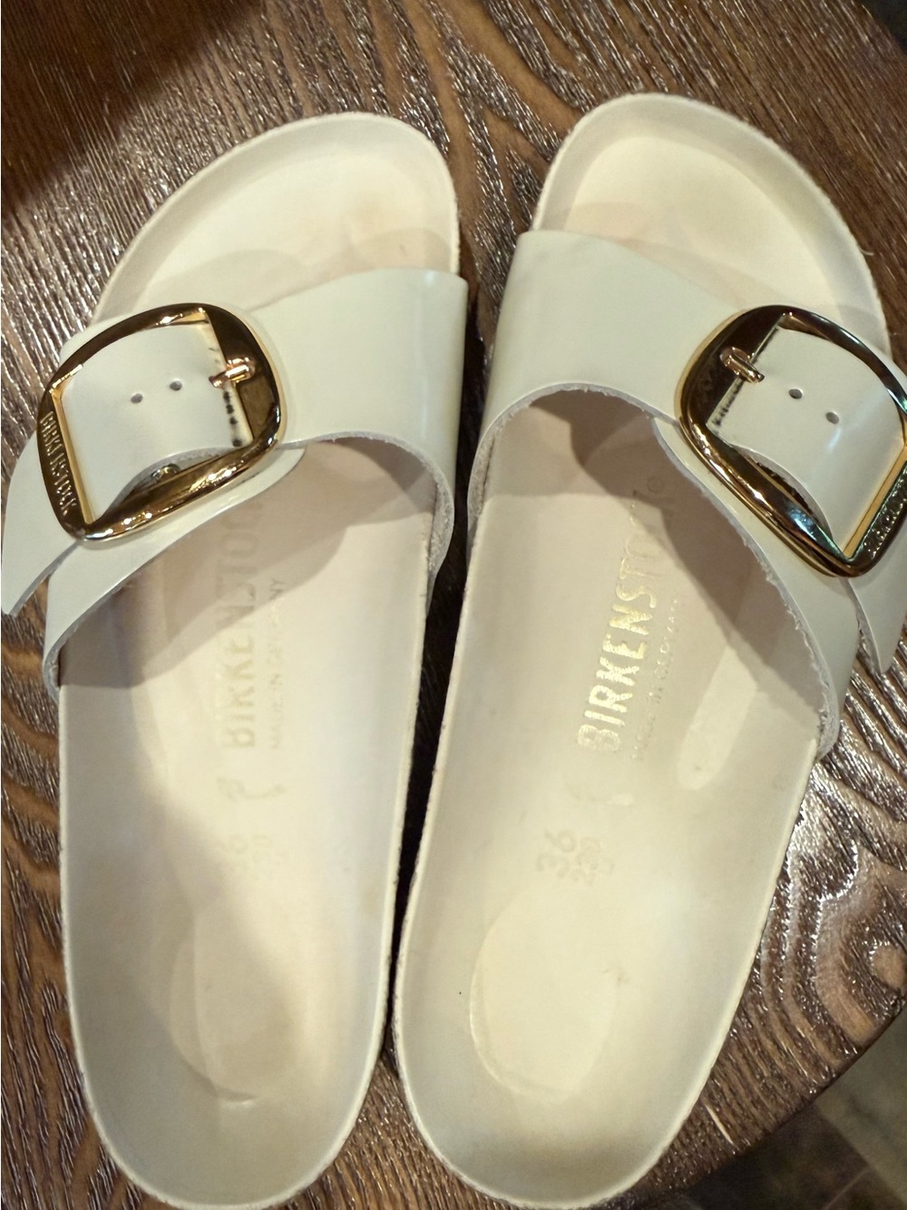 Birkenstock White Slide Sandals with Gold Buckles
